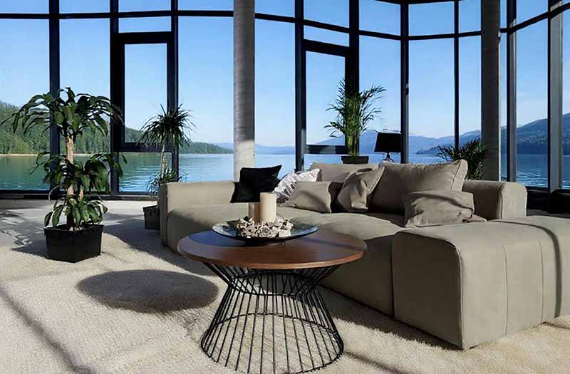 Spazio abitativo luminoso e arredato con gusto, affacciato su un lago alpino – immagine che rappresenta lo stile di vita in un appartamento di proprietà in Ticino.