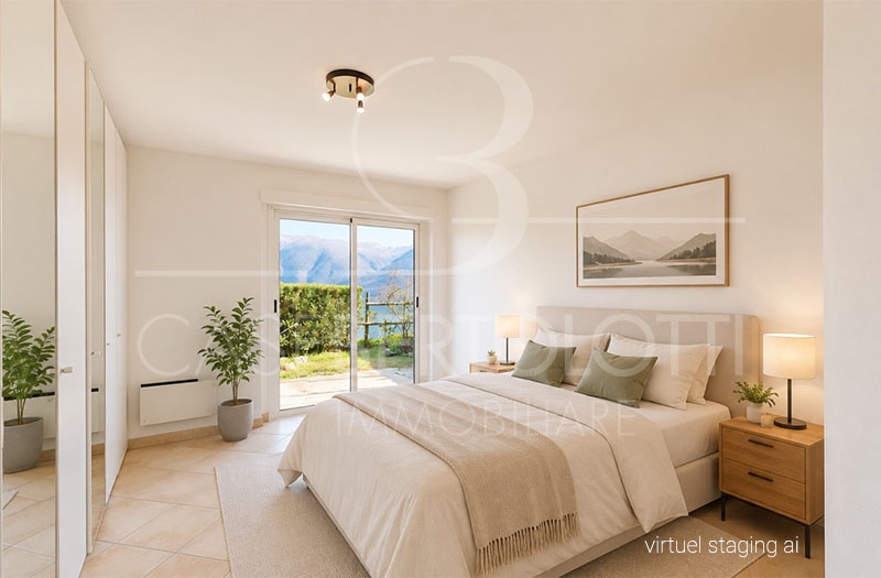 Helles Schlafzimmer mit Terrasse und Bergblick